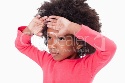 Girl with her hands on her forehead