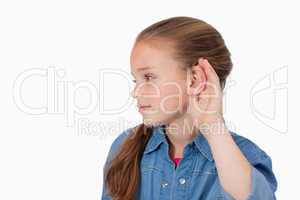 Cute girl pricking up her ear