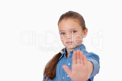Girl saying stop with her hand