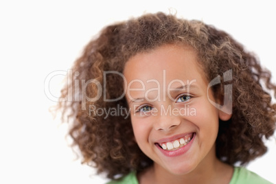 Close up of a girl smiling at the camera