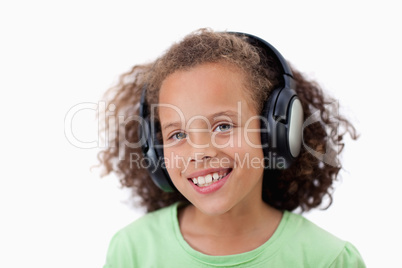 Happy girl listening to music