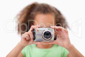 Little girl taking a picture