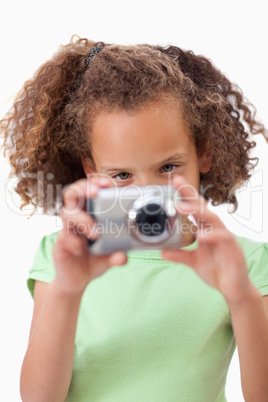 Portrait of a girl taking a picture