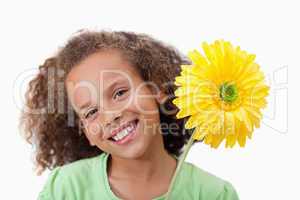 Cute girl holding a flower