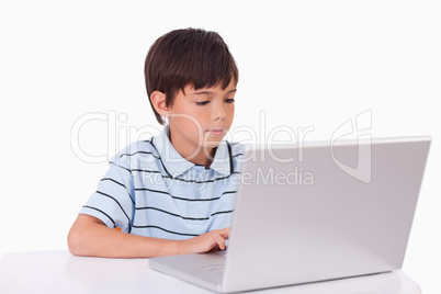 Boy using a laptop