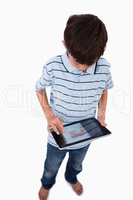 Portrait of a boy using a tablet computer