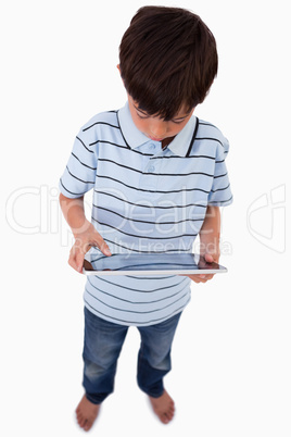 Portrait of a little boy using a tablet computer