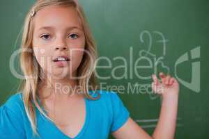 Little schoolgirl showing her result