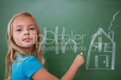 Schoolgirl learning the alphabet