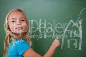 Schoolgirl learning the alphabet