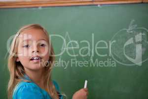 Young schoolgirl learning the alphabet