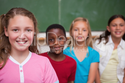 Classmates posing in a row
