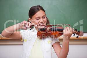 Schoolgirl playing the violin