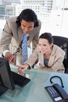 Portrait of a focused business team using a computer