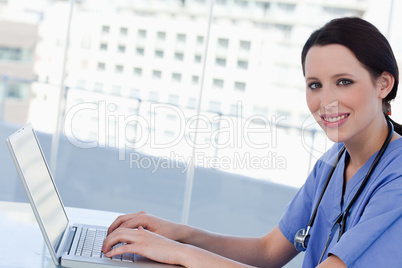 Doctor using a notebook