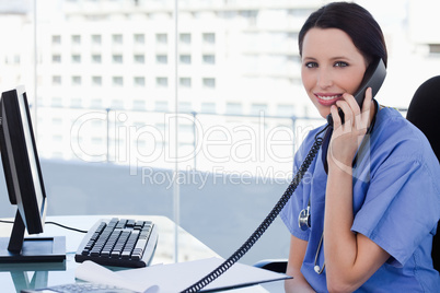 Female doctor on the phone