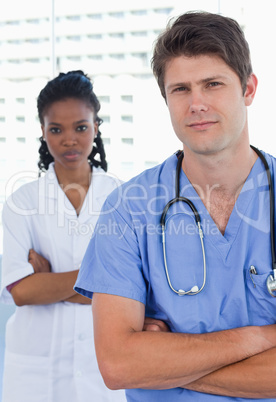 Portrait of professional doctors standing up