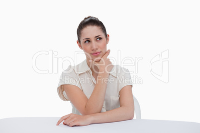 Thoughtful businesswoman sitting