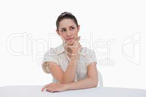Thoughtful businesswoman sitting