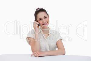Smiling businesswoman making a phone call