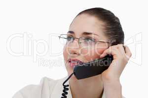 Close up of a secretary making a phone call