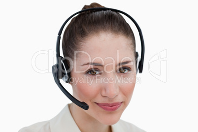 Close up of an operator posing with a headset