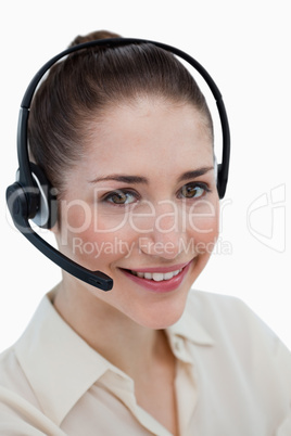 Portrait of a happy operator posing with a headset