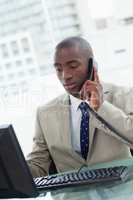 Portrait of an office worker making a phone call