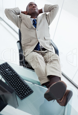 Portrait of a happy businessman relaxing