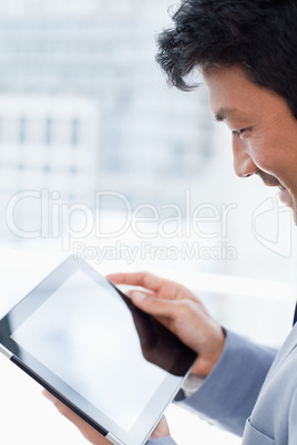 Portrait of a office worker using a tablet computer