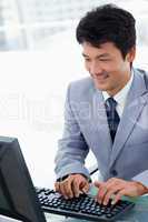 Portrait of a manager using a computer