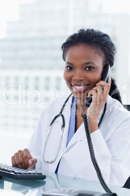 Portrait of a female doctor on the phone