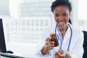 Female doctor giving medication