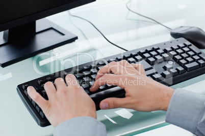 Masculine hands typing