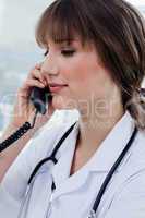 Portrait of a gorgeous doctor on the phone
