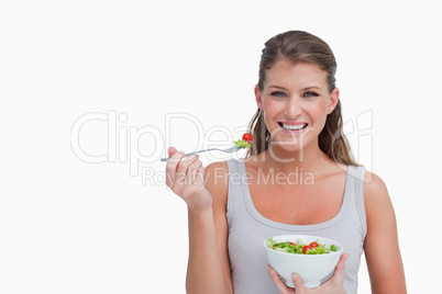 Woman eating a salad