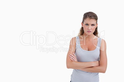 Unhappy woman with the arms crossed