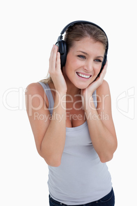 Portrait of a woman listening to music