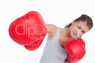 Healthy woman boxing