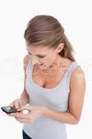 Portrait of a woman reading a text message