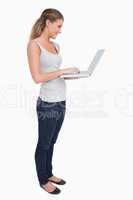 Portrait of a woman using a laptop