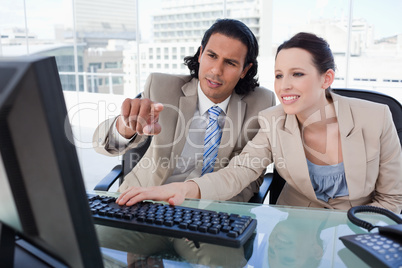 Working business team using a computer