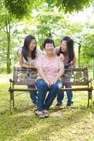 Asian mother and daughters