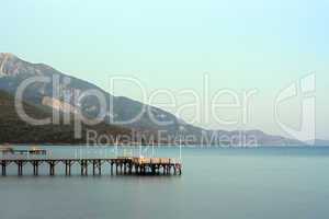 Long exposure on wooden pier at dawn