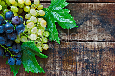 Assortment of grapes on a rustic wooden table