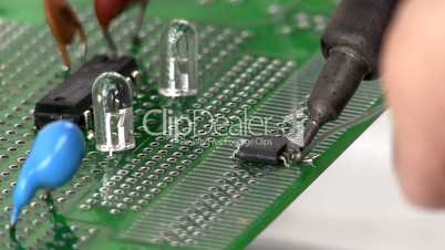 Soldering surface mount IC to circuit by hand