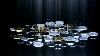 Coin Fall,group of RMB coins and rays light.