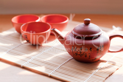 Chinese ceramic teapot and cups.