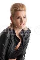 blond young woman portrait in leather jacket