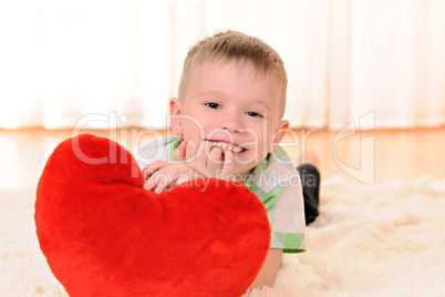 child with a plush heart